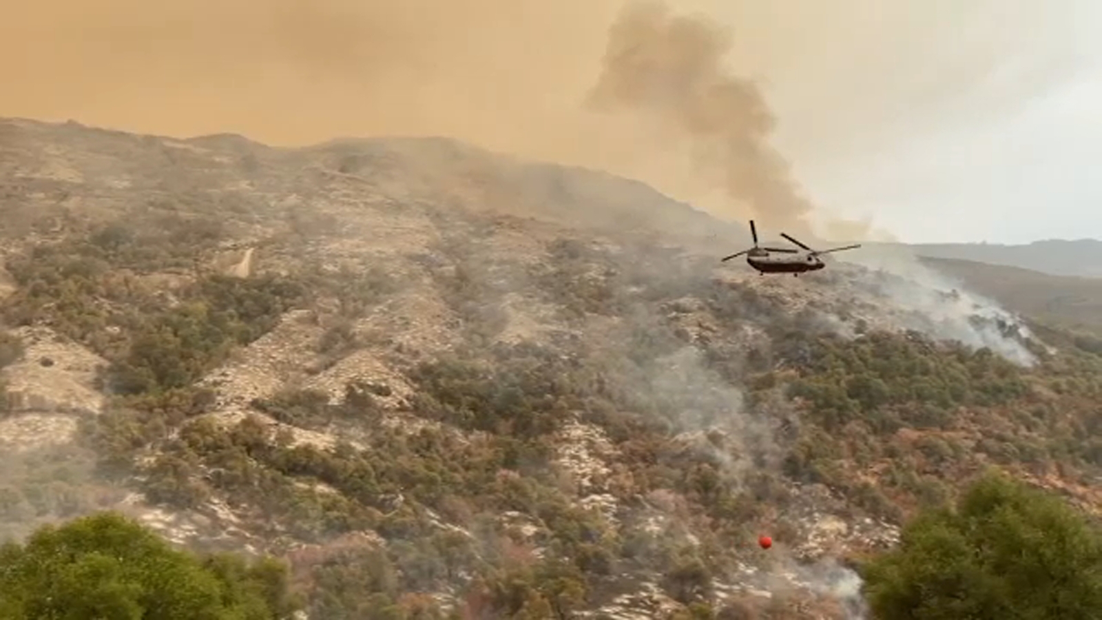 Smokefilled skies trigger an air quality alert, but aid firefighters