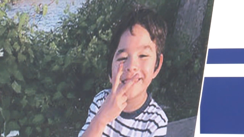 Murder charge for father's girlfriend in 7-year-old's starvation death