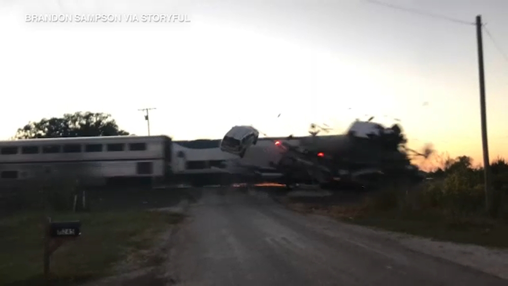 4 hurt after Amtrak train collides with semi car hauler