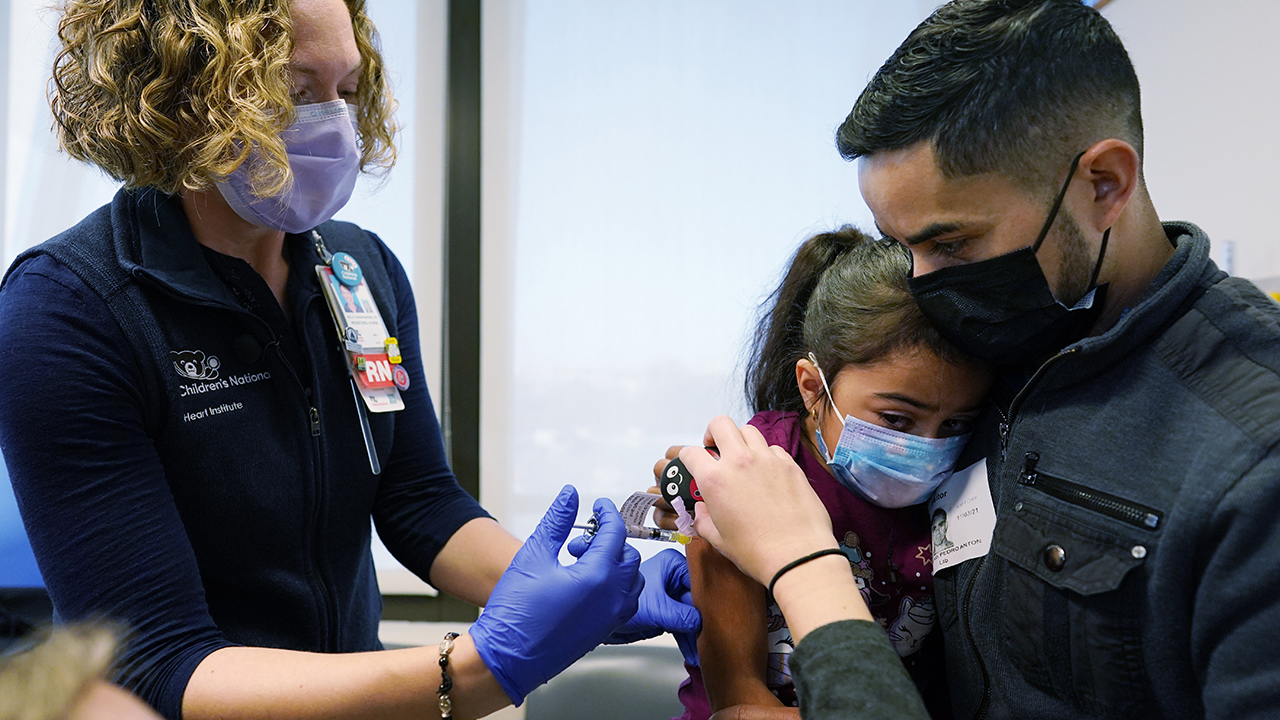 Kids ages 5-11 roll up sleeves for COVID vaccine