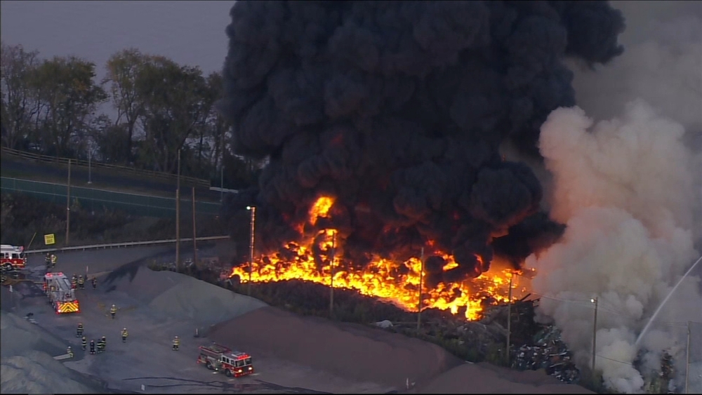 Junkyard fire smolders hours after igniting in Southwest Philly