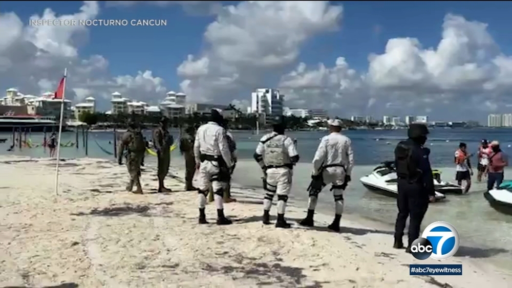 Gunmen on jet skis open fire into the air at beach near Cancun's hotel