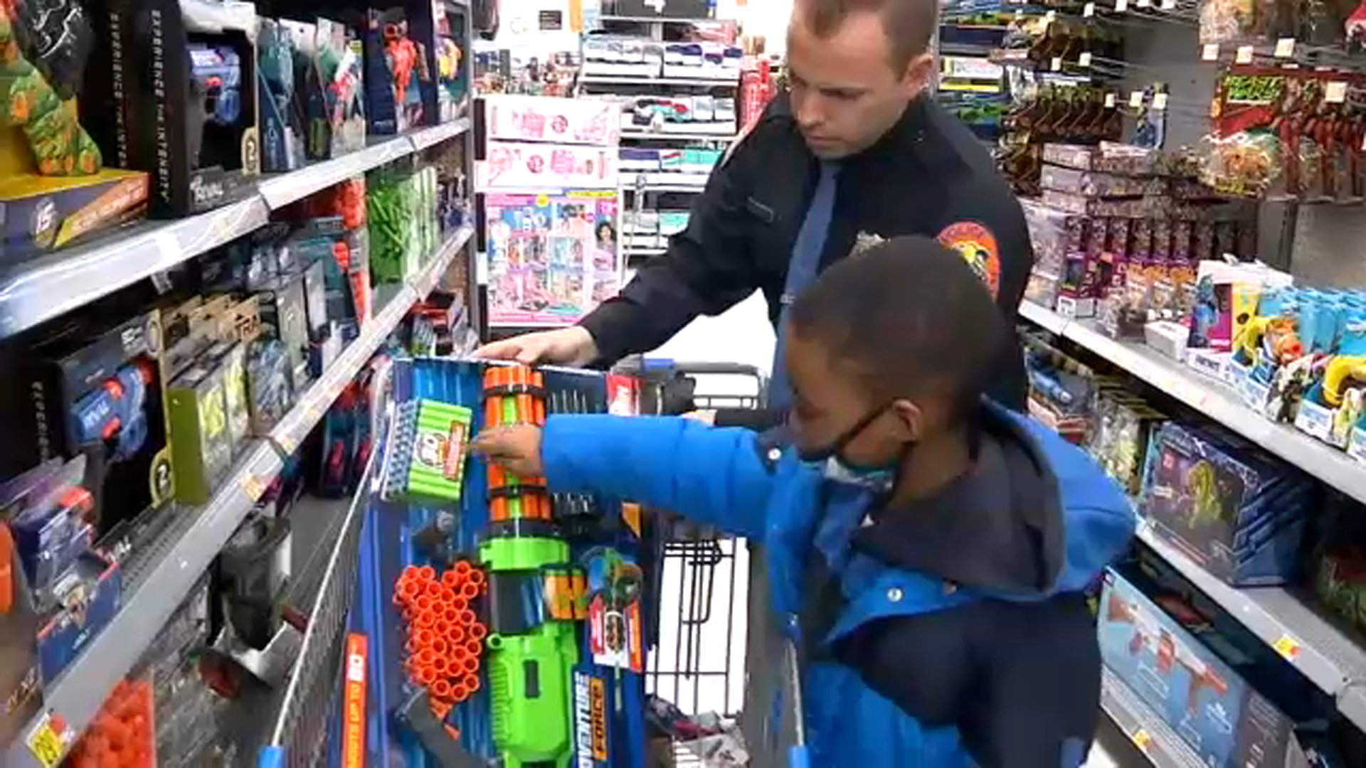 Cops team up with students to buy holiday gifts for their families