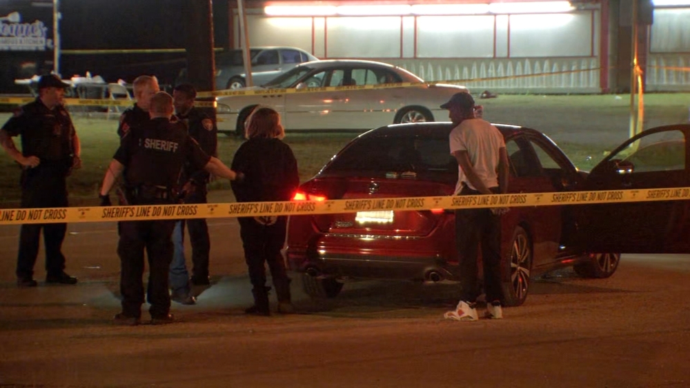 1 dead, 13 hurt in drive-by shooting at vigil in Baytown, deputies say