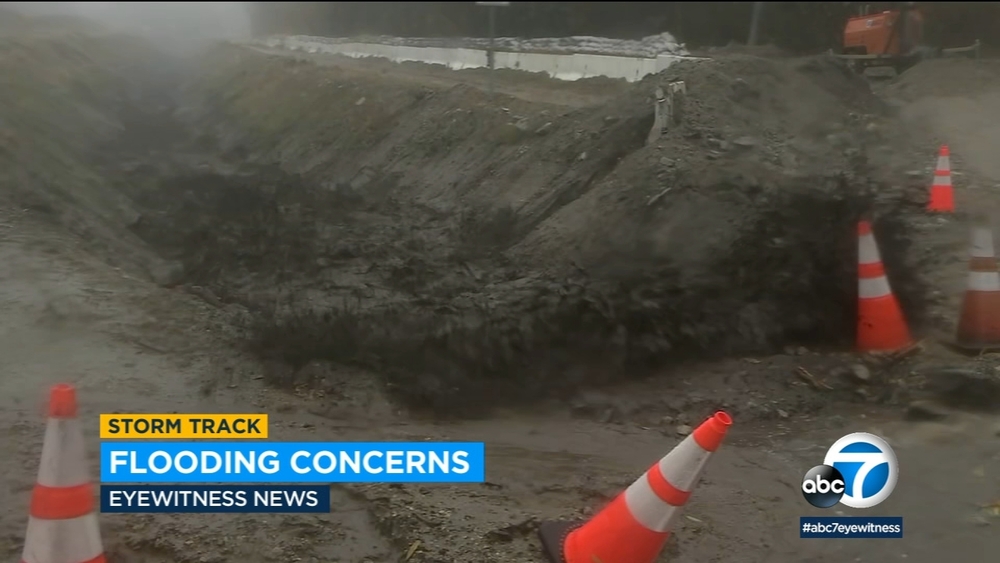 Debris flow rushes down IE streets as heavy rain pounds region