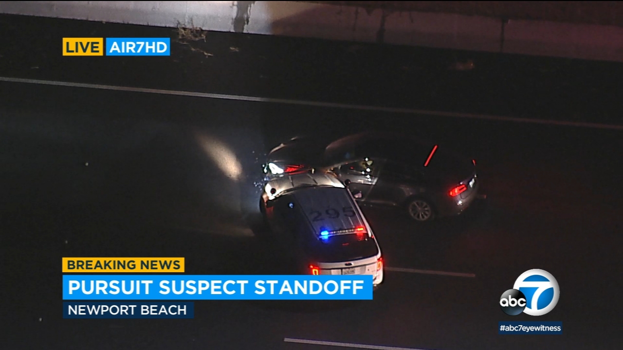 CHP slams into Tesla to stop suspect after chase, standoff in OC