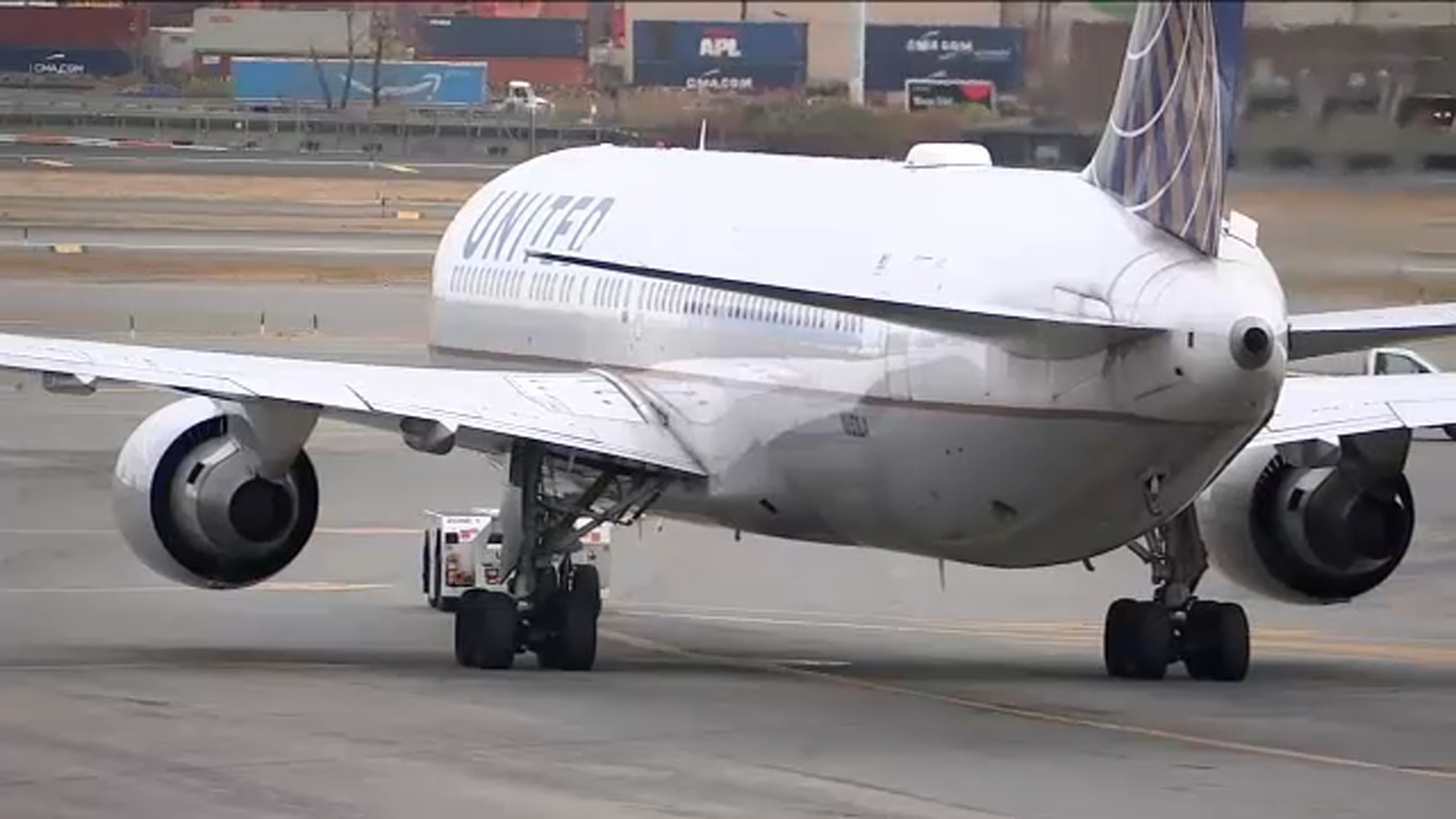 Holiday travel surges at local airports amid spike in COVID cases