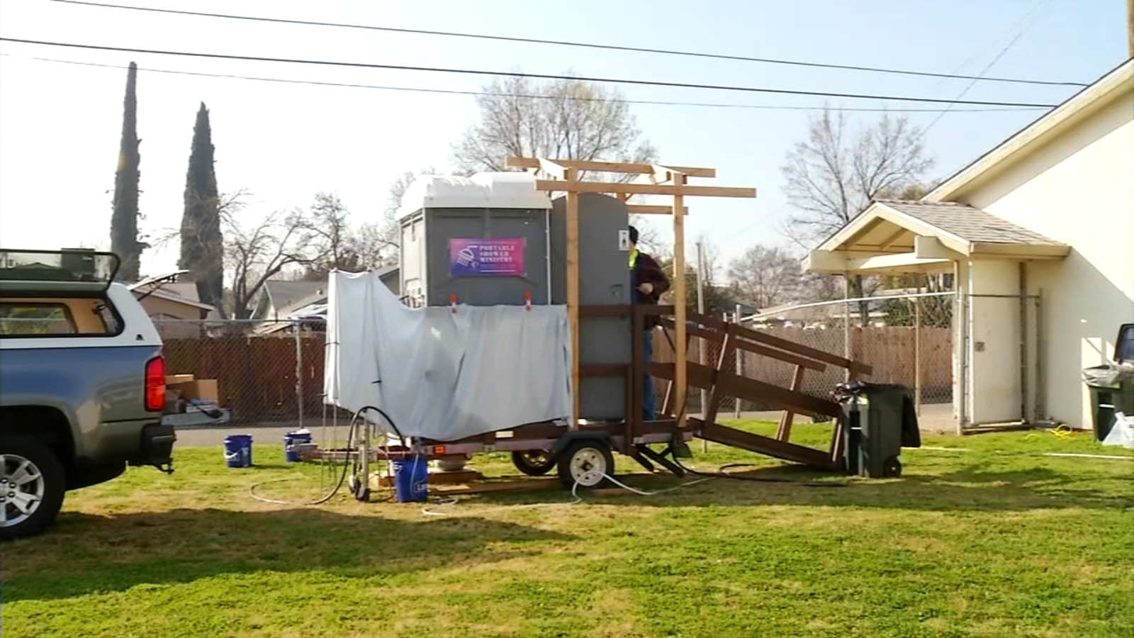 Volunteer group providing warm showers for those experiencing