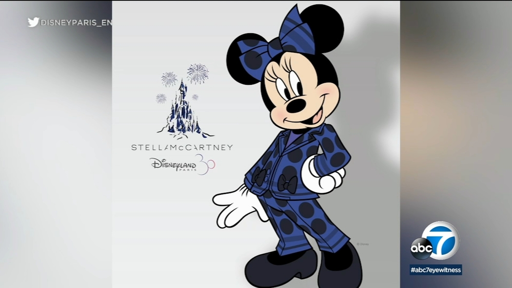Minnie Mouse ditches iconic red dress for pantsuit to commemorate 30th  anniversary of Disneyland Paris - ABC7 San Francisco