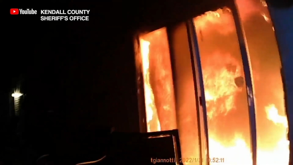 Video shows Kendall deputies rescue 2 from burning home
