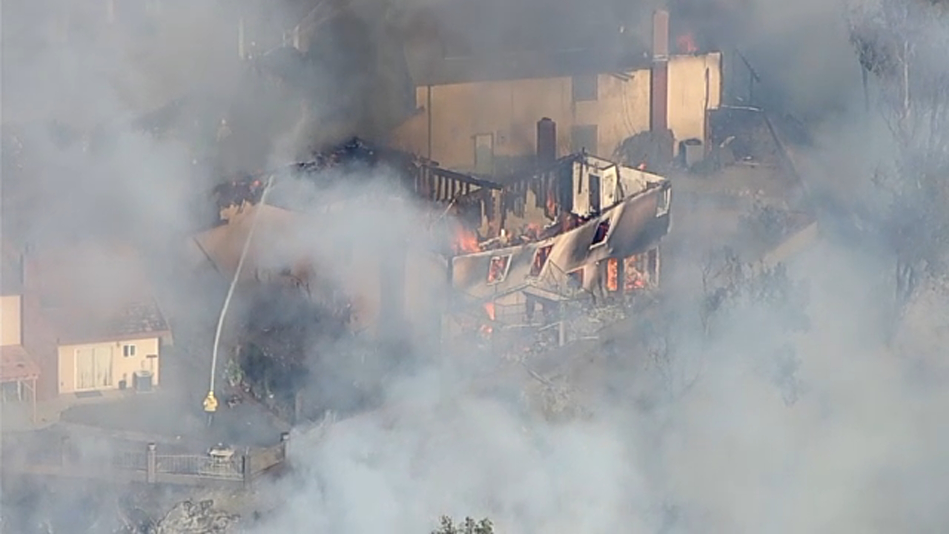 Man arrested in brush fire that destroyed at least 2 homes in Whittier