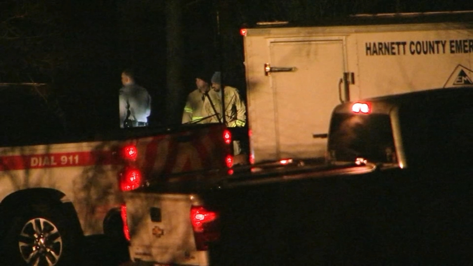 Firefighters find dead person outside 2 burning buildings in