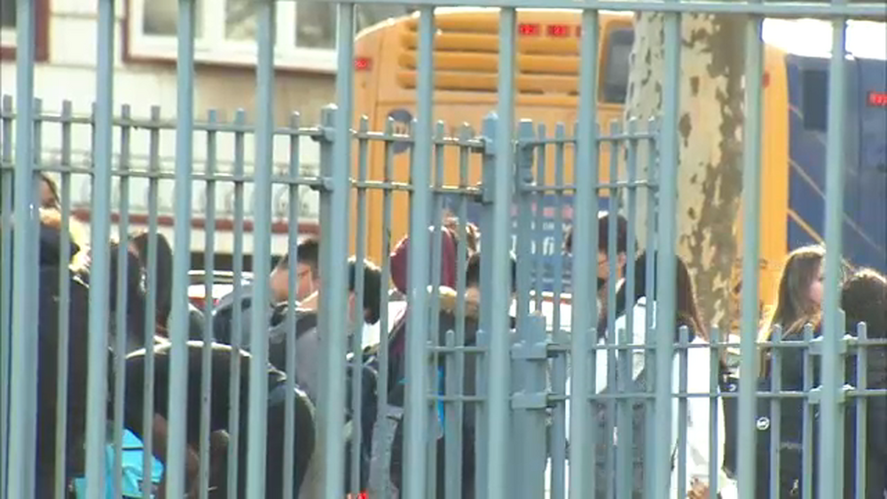 High school teacher accused of slamming student into wall