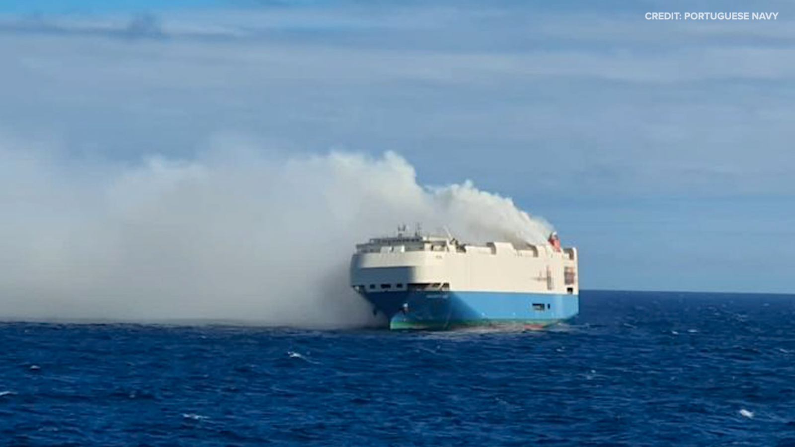 Cargo ship packed with luxury cars, including Porsches and Volkswagens