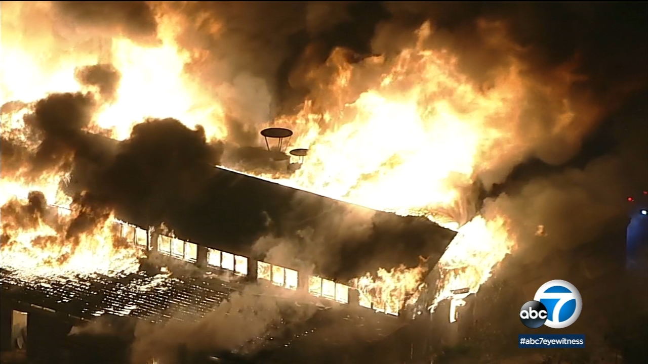 Massive blaze rips through abandoned Downey asylum 