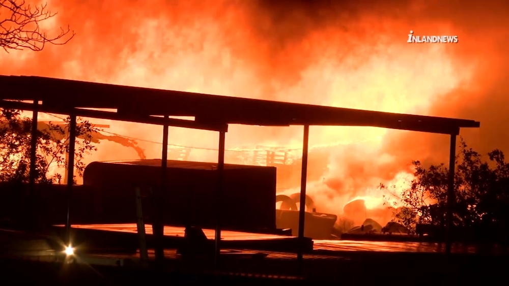 Crews battle large pallet yard fire in Riverside County
