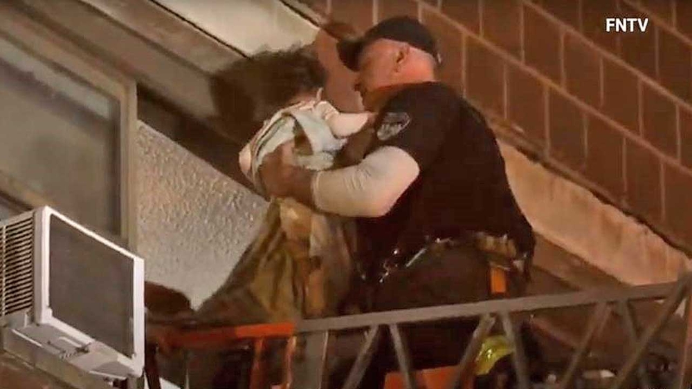 Baby among several rescued from NYC fire; 11 hurt
