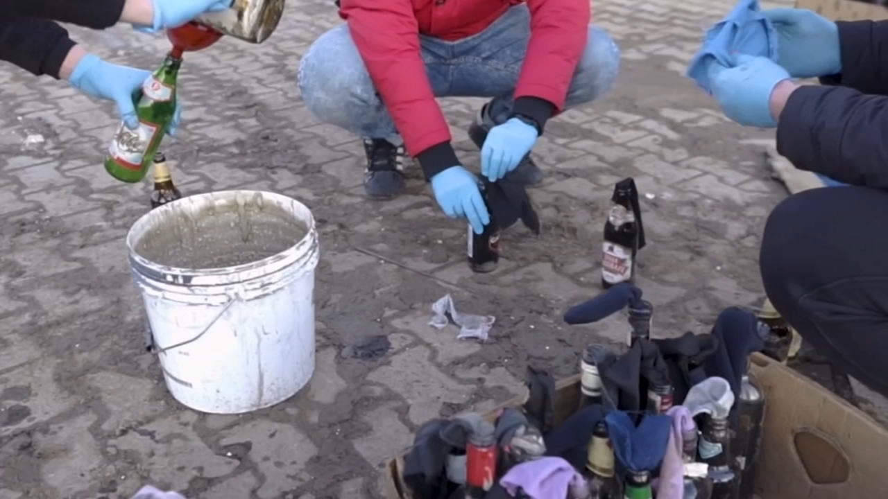 Ukrainian residents making Molotov cocktails to help defend cities