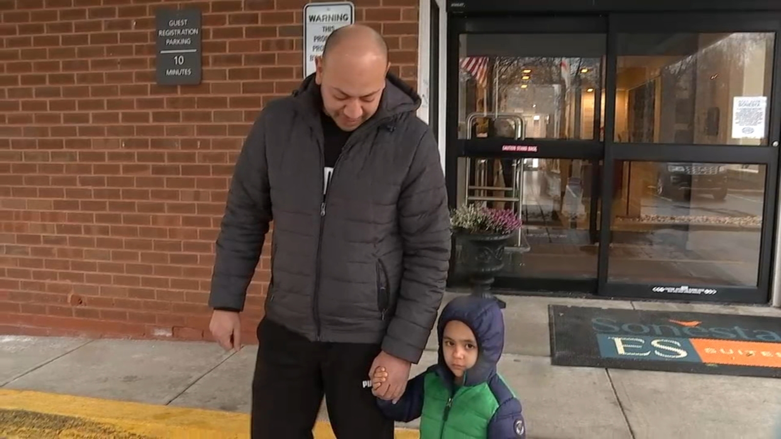 Exclusive Father tossed baby from burning apartment complex to first