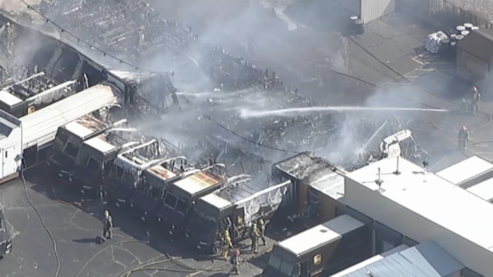AIR7HD: Footage shows multiple UPS trucks destroyed after fire