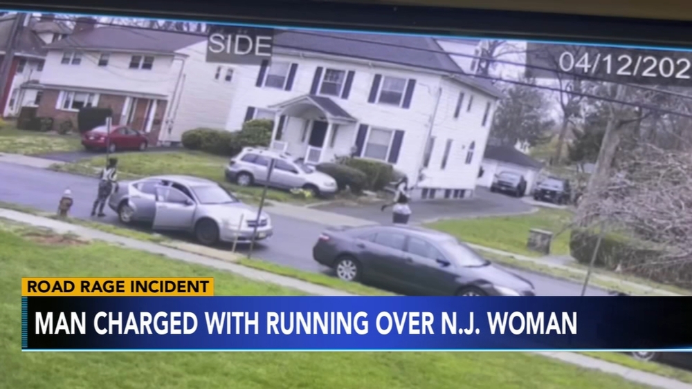 NJ man charged with running over woman in road rage incident