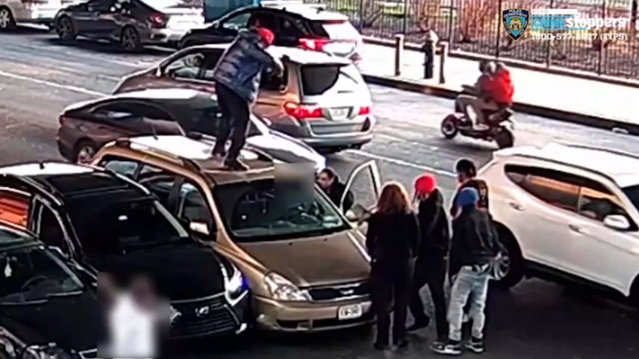 Group of men surround minivan, attack driver after crash
