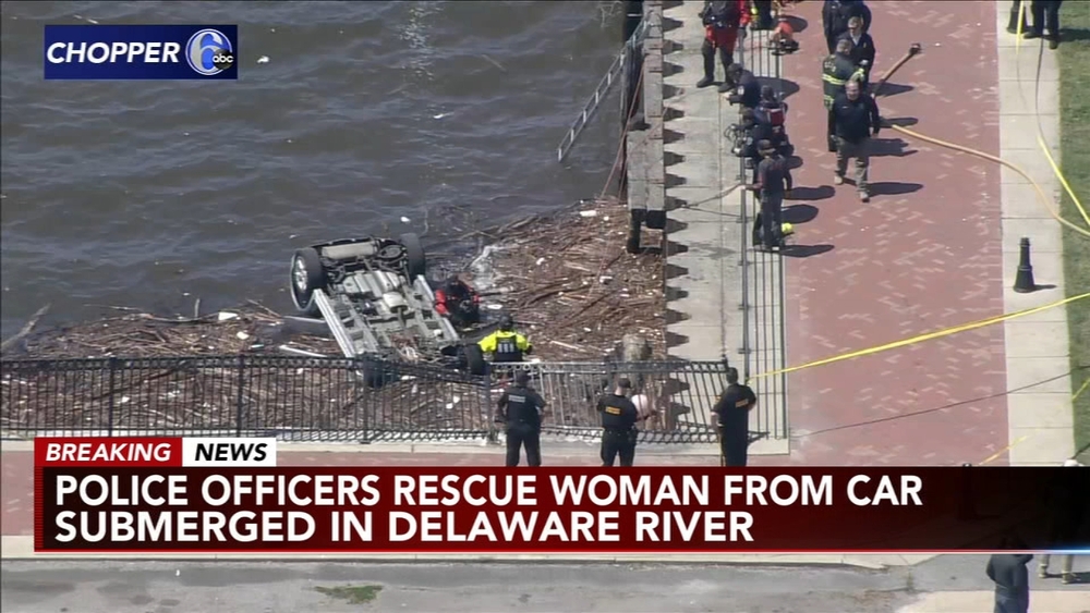 Officials: Woman pulled from river after car plunges off NJ pier