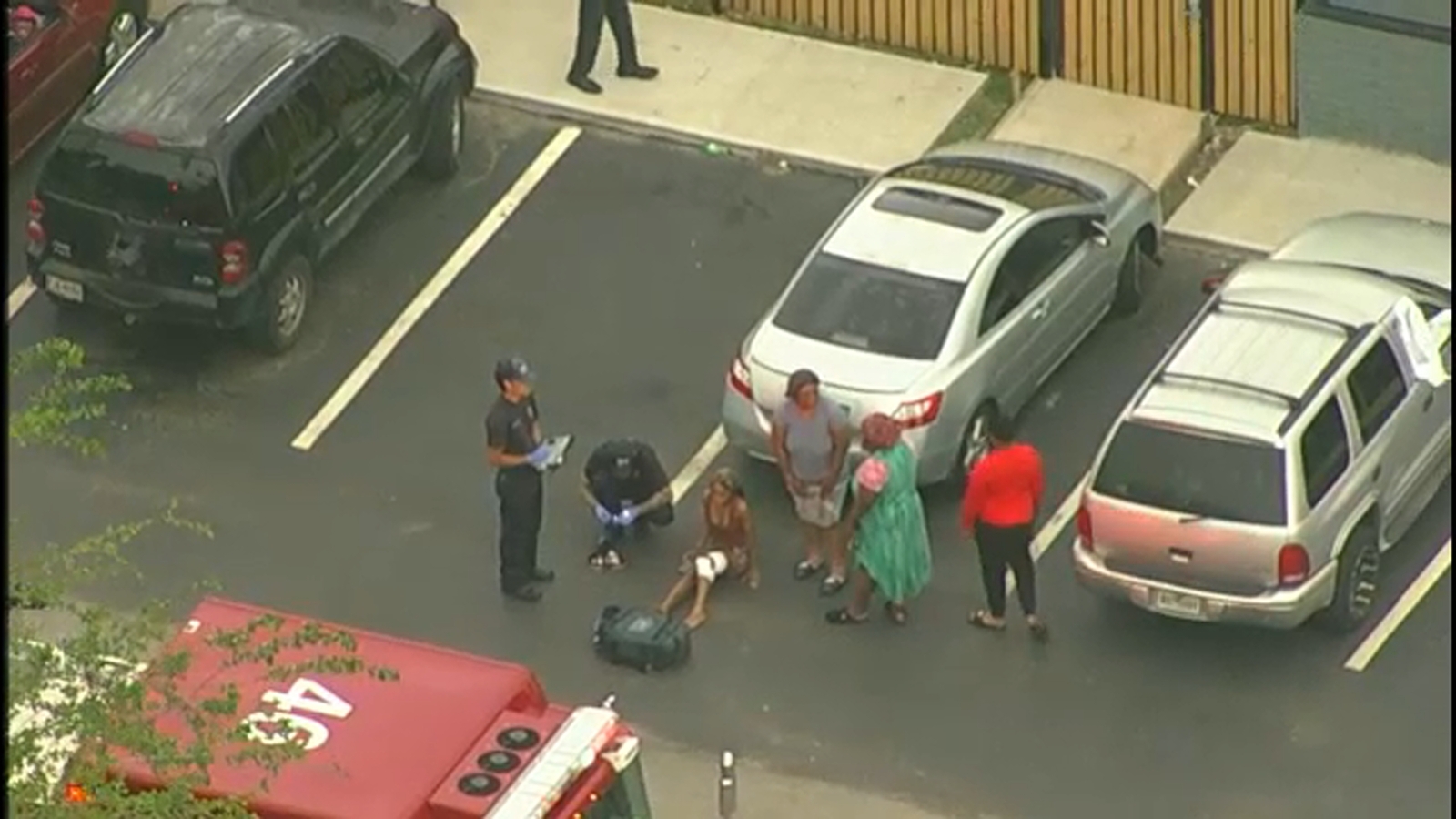 1 in custody after woman shot in leg at apartment complex in southeast ...