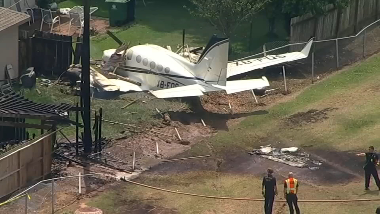 Small plane with 4 on board goes down and plows into backyard
