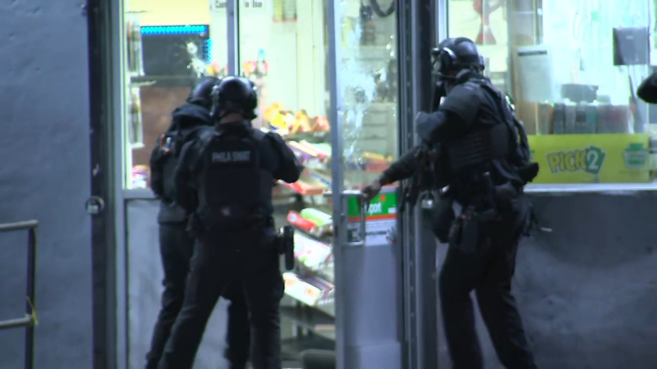 Officers swarm gas station after gunmen open fire on crowd: Police