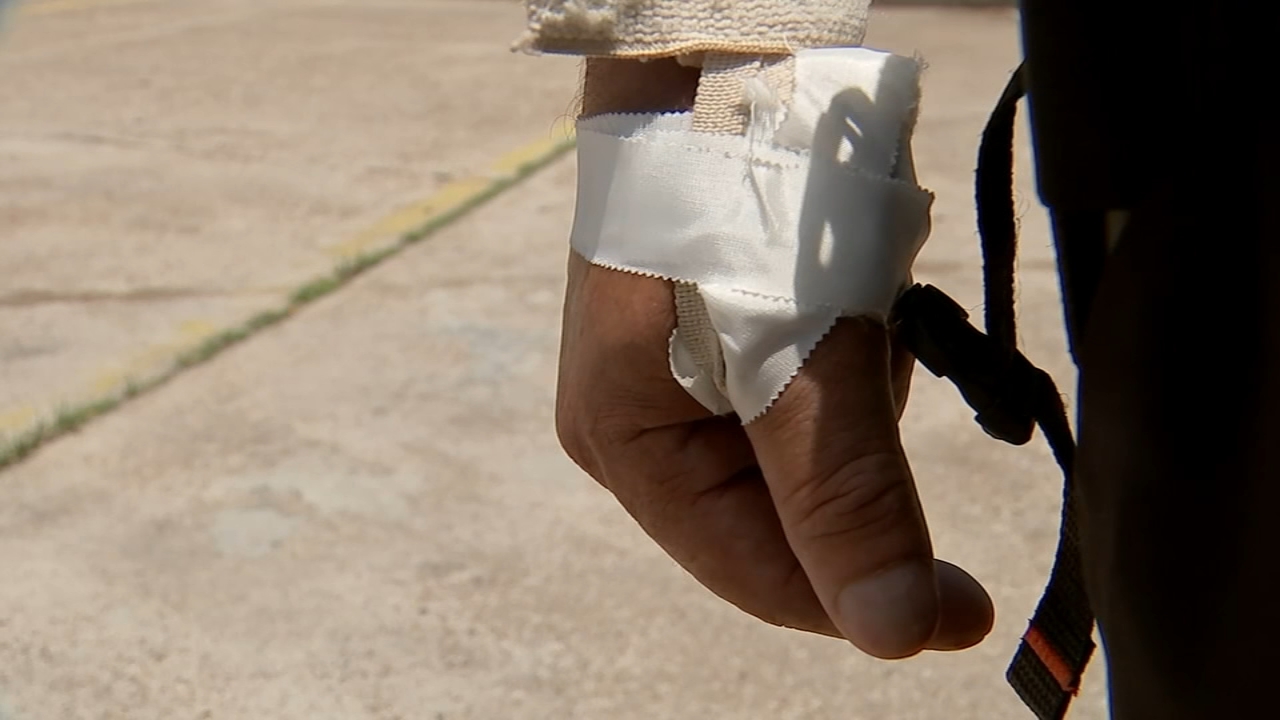 Man hit by would-be robber's shot says bullet was headed for his wife