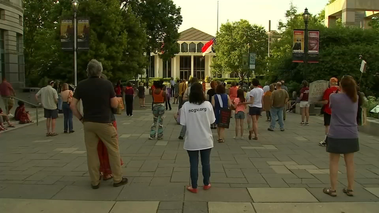 Local families, leaders hold vigil for school massacre victims