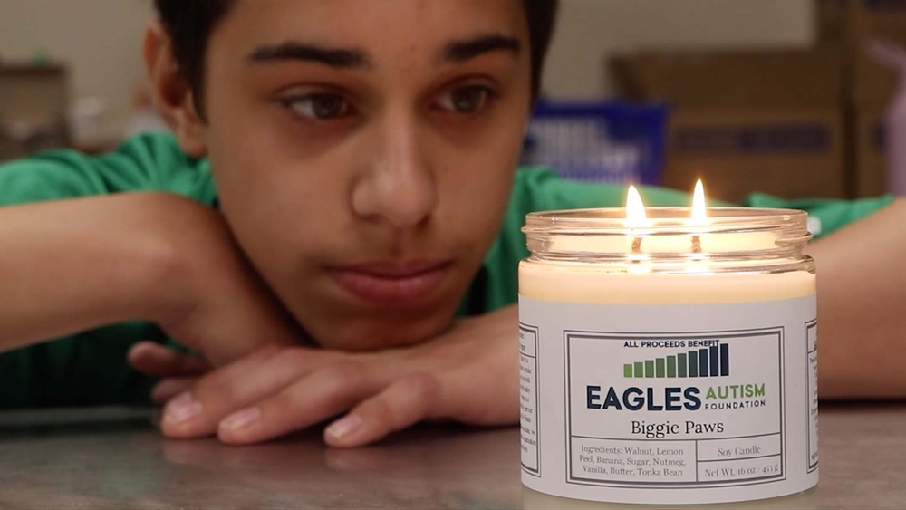 13-year-old's candle company raises awareness for autism
