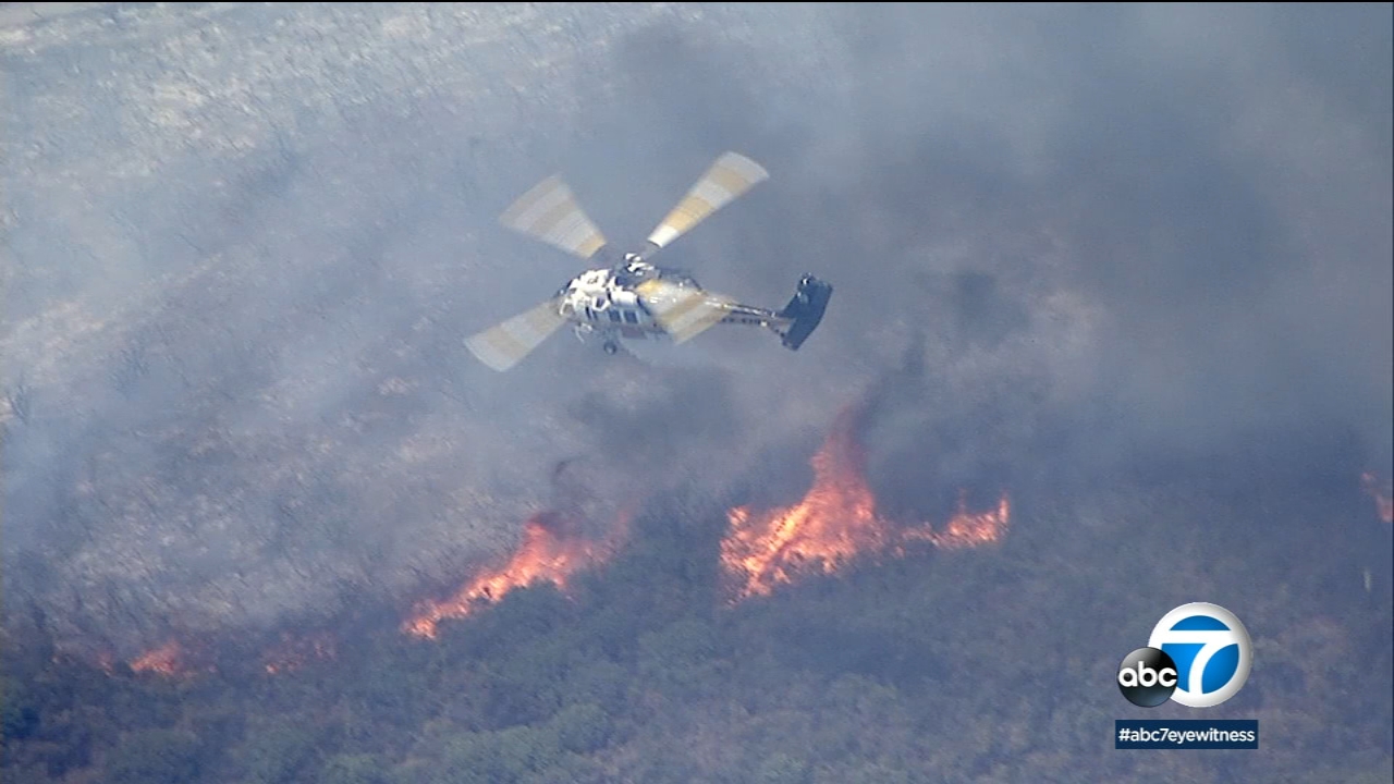 Fire crews battle brush fire near Bouquet Reservoir