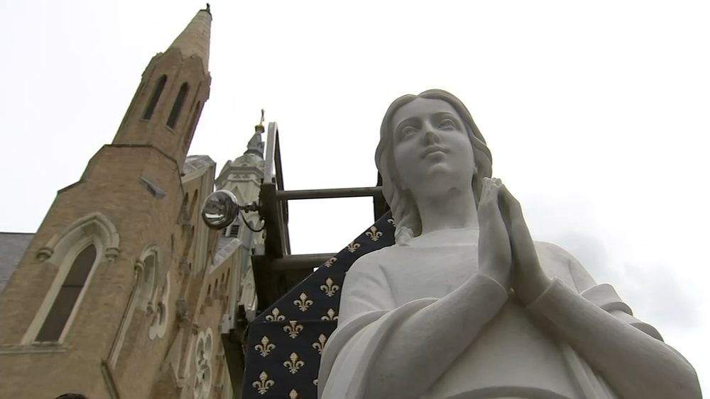 Mary statue brought home to Our Lady of the Angels church