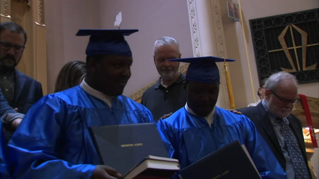 Floyd and Lloyd Russell graduate from high school