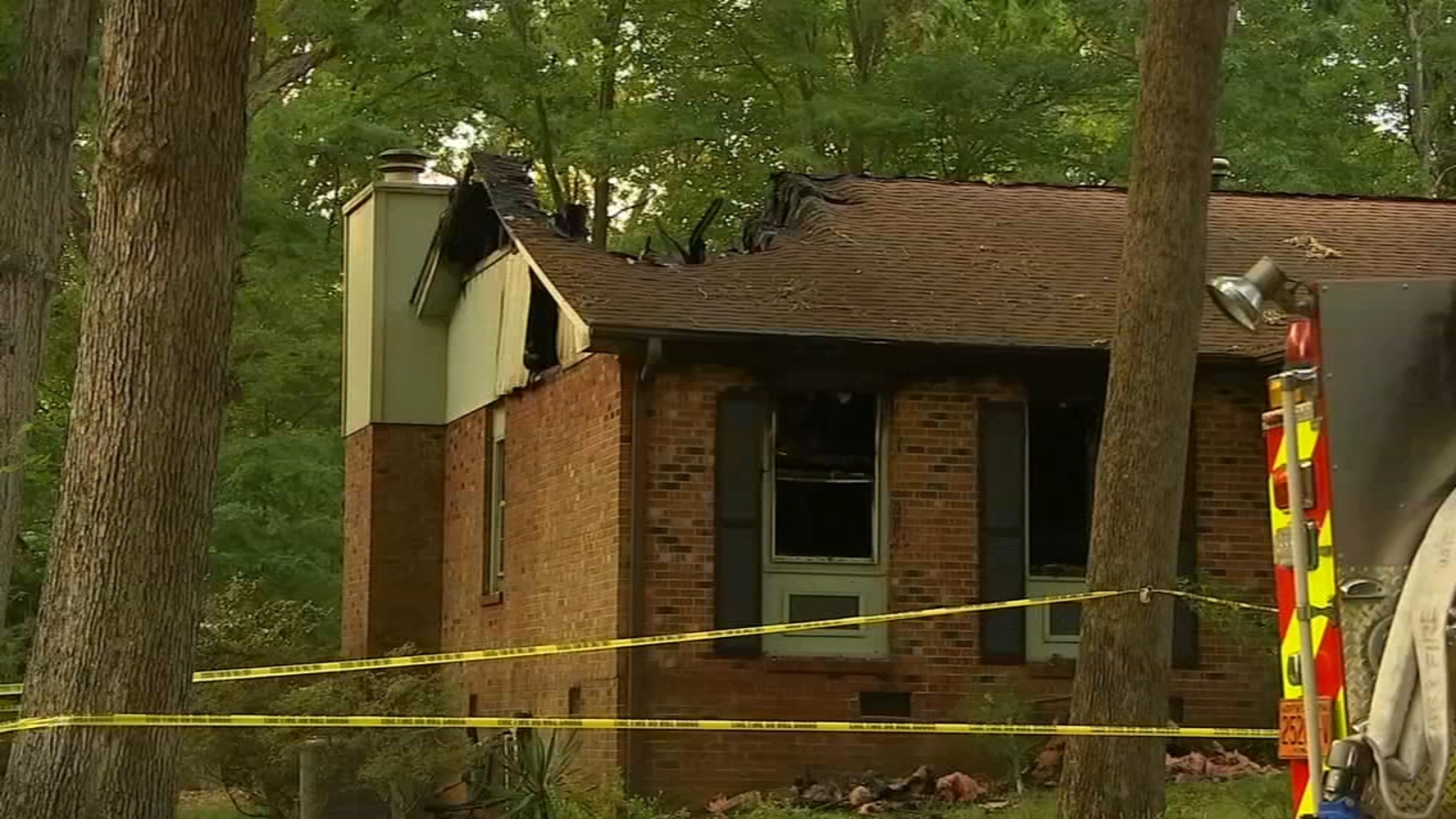 Woman dies, two firefighters taken to hospital after Cary house fire