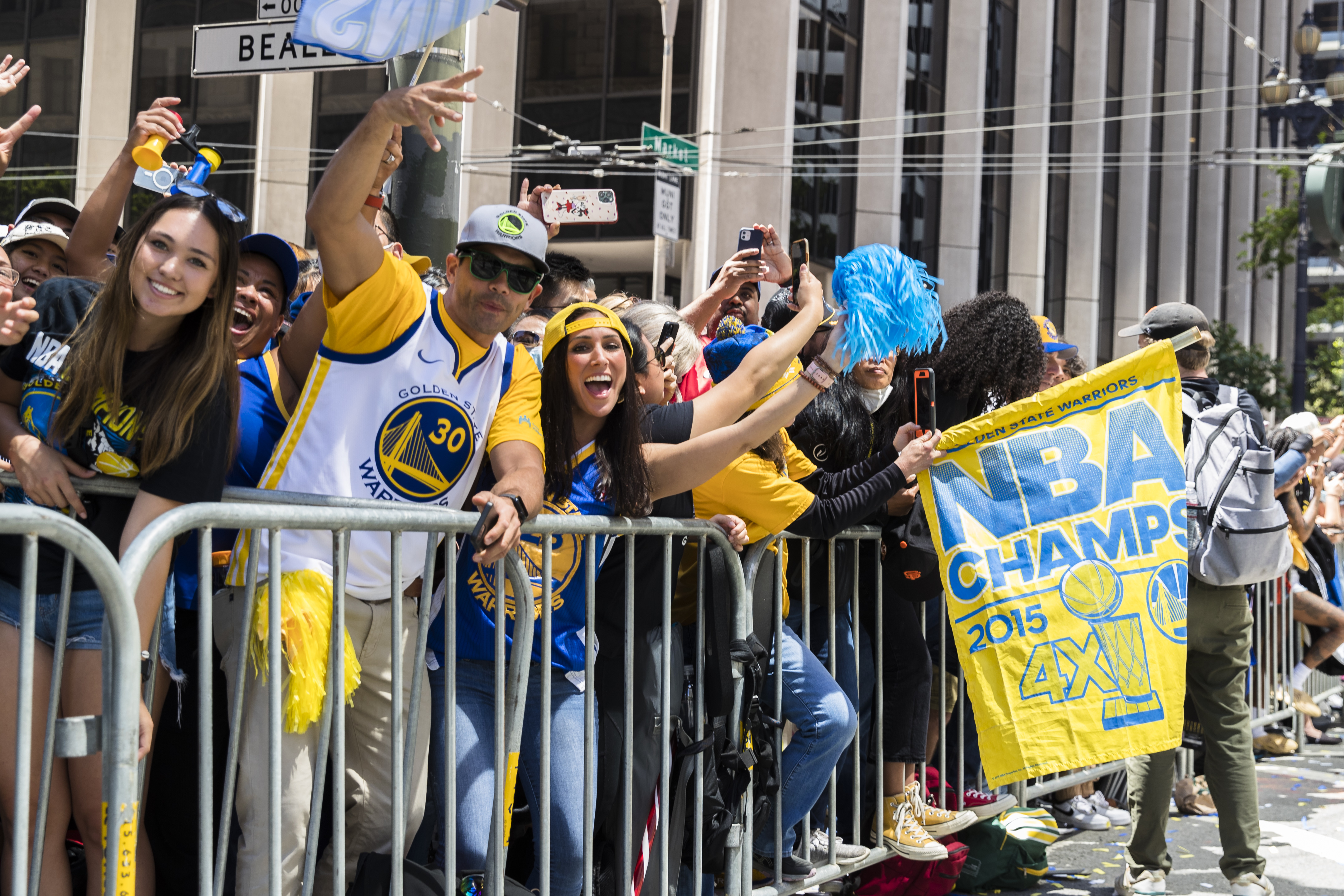 Fans cheer the Golden State Warriors during the NBA Championship parade in San Francisco, Monday, June 20, 2022, in San Francisco.