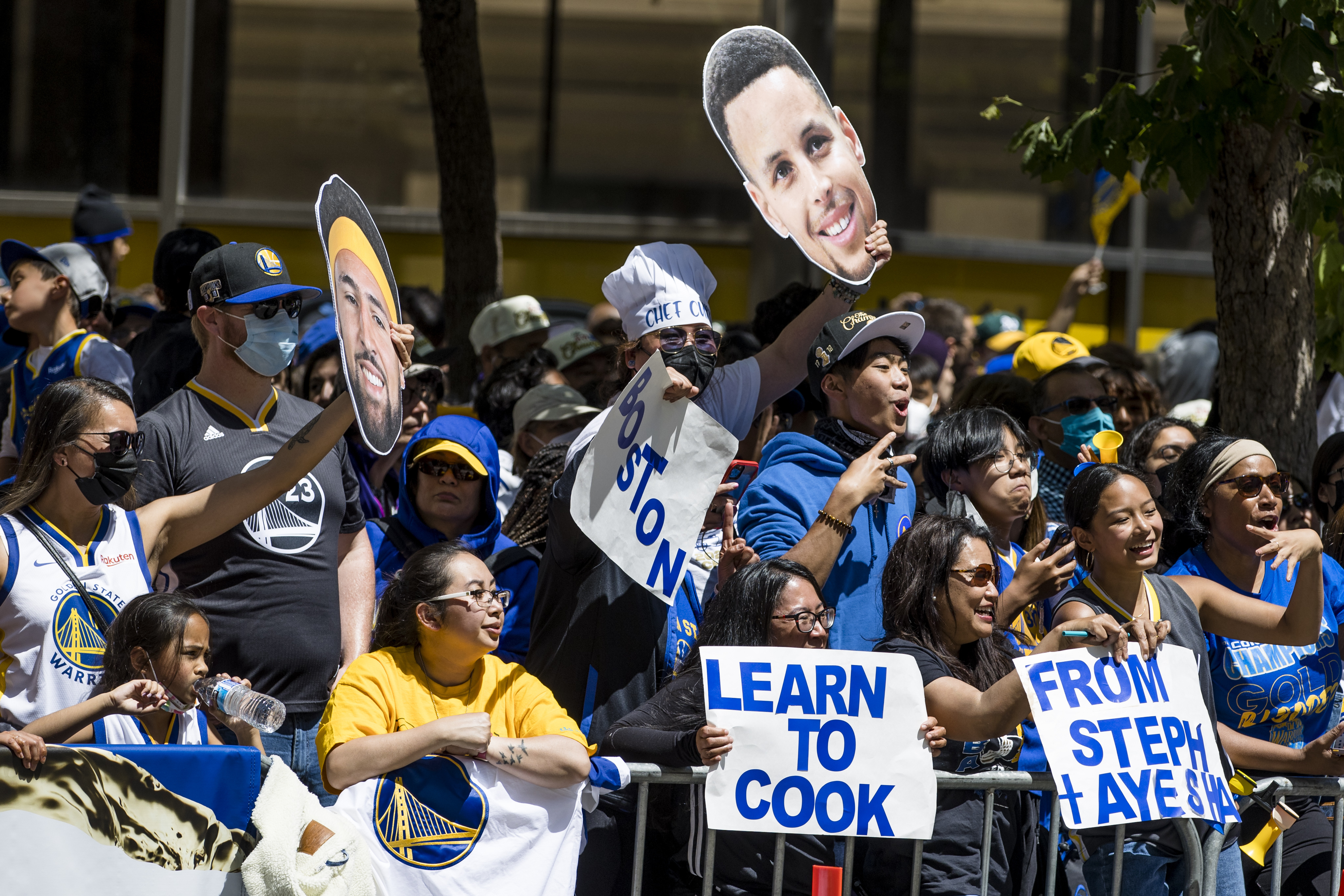Fans cheer the Golden State Warriors during the NBA Championship parade in San Francisco, Monday, June 20, 2022, in San Francisco.