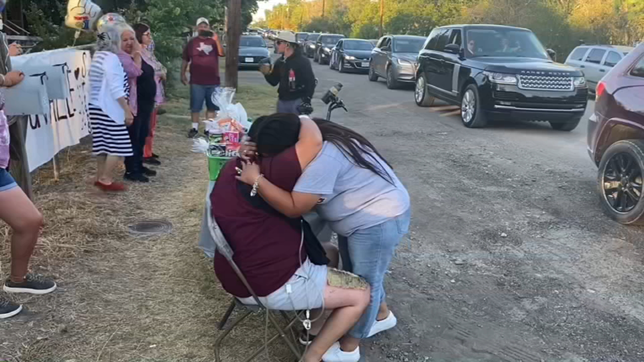 Parent of slain student embraces teacher 