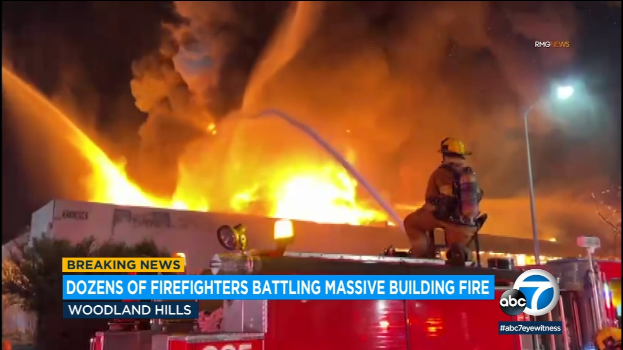 Massive fire rips through Woodland Hills commercial building