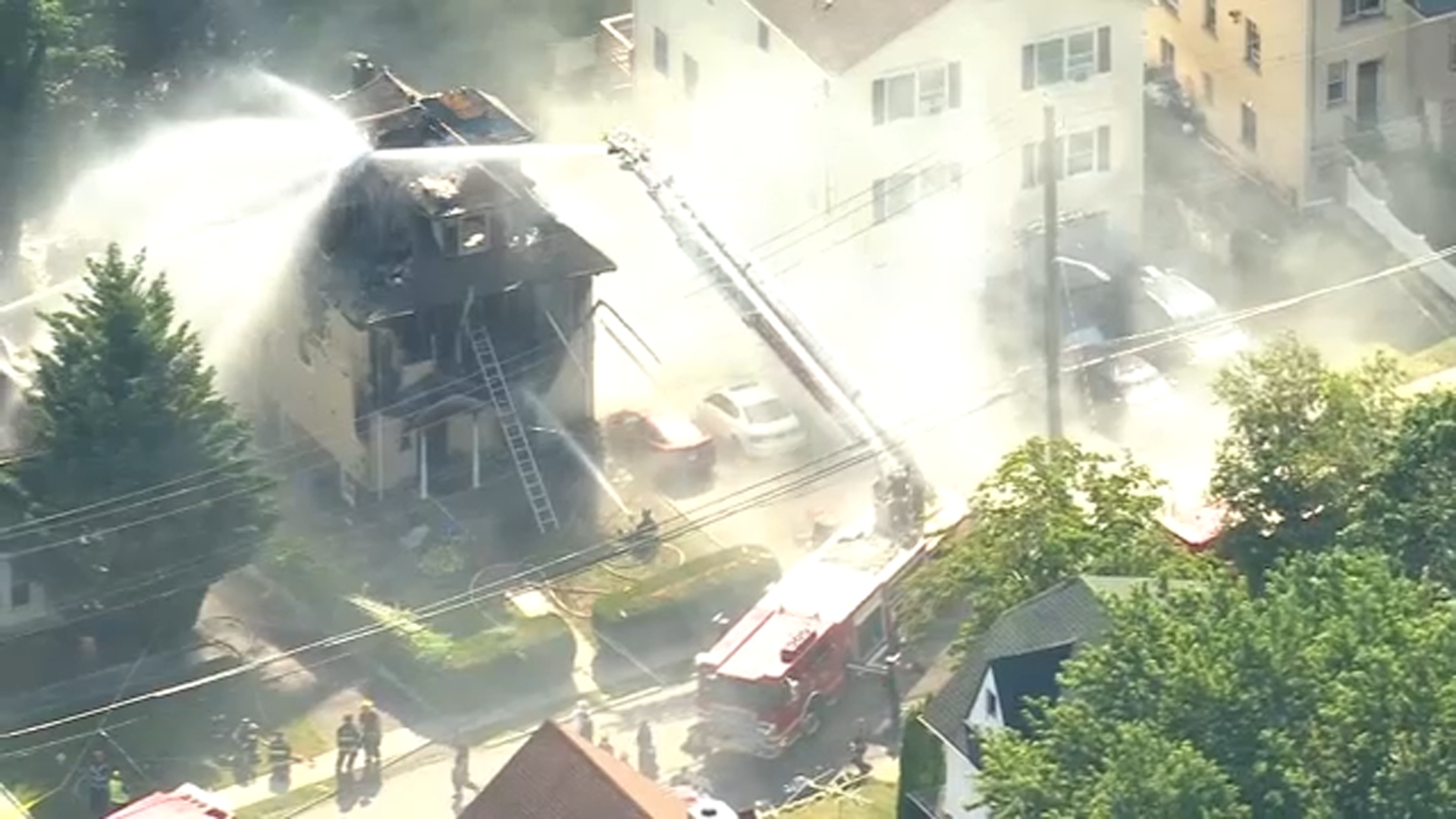 Fire guts multi-family home in NY, man jumps from 3rd-floor window