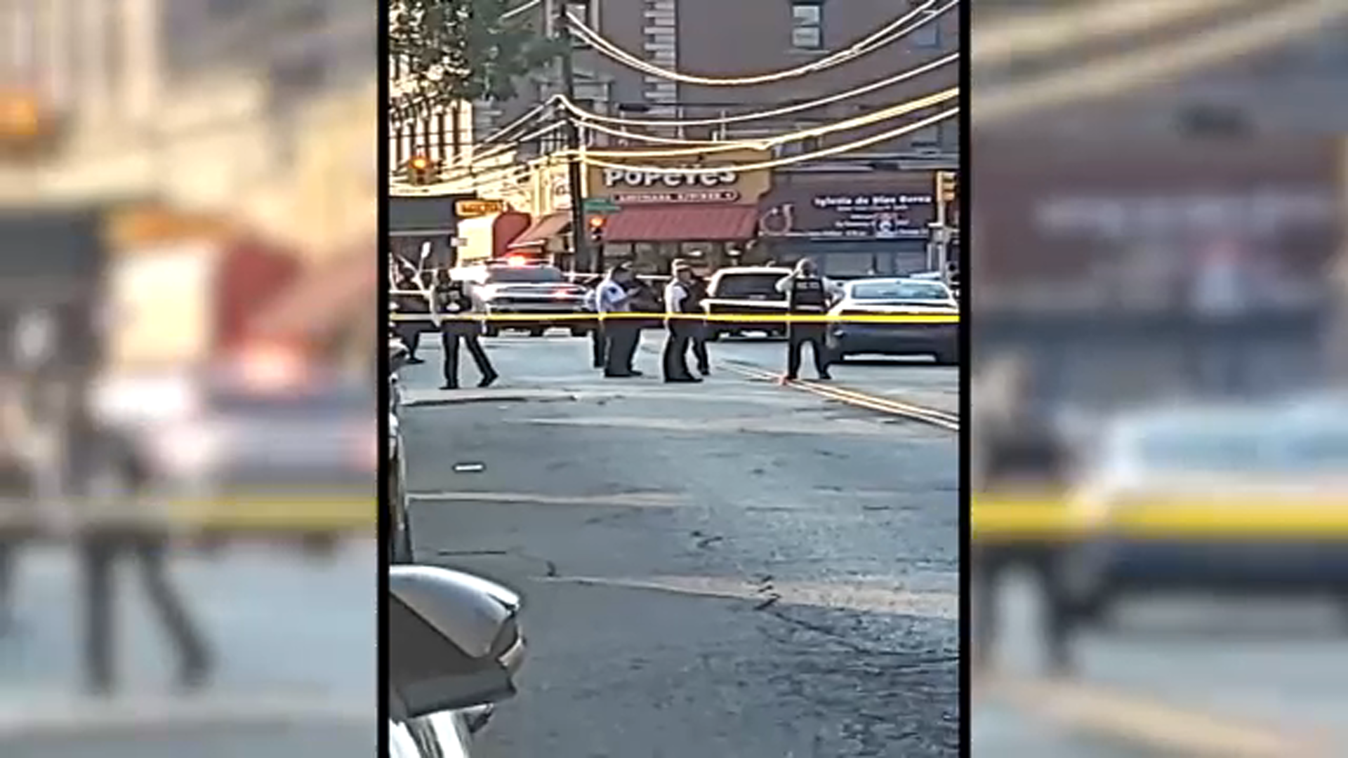 Mother shot while walking with 2 young kids in Queens