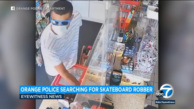 Video shows armed man rob Orange gas station - ABC7 Los Angeles