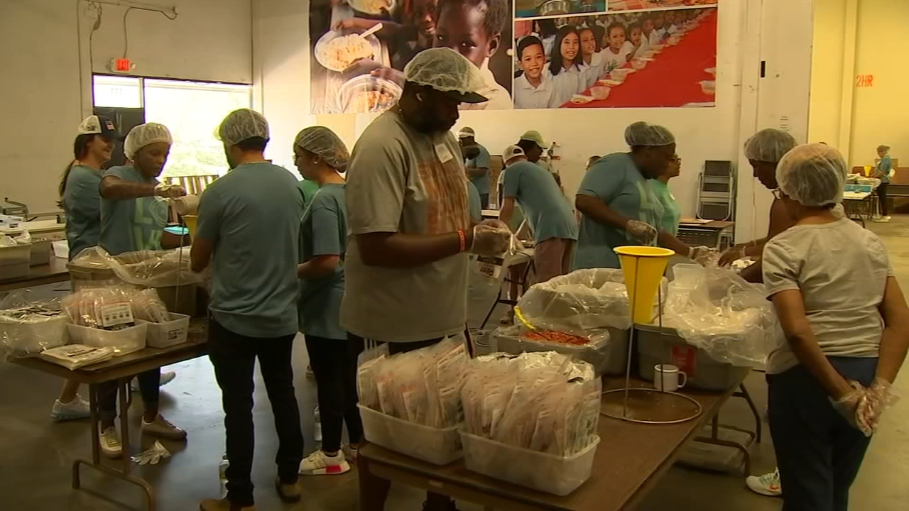 Raleigh church packs, loads 150,000 meals for shipment overseas