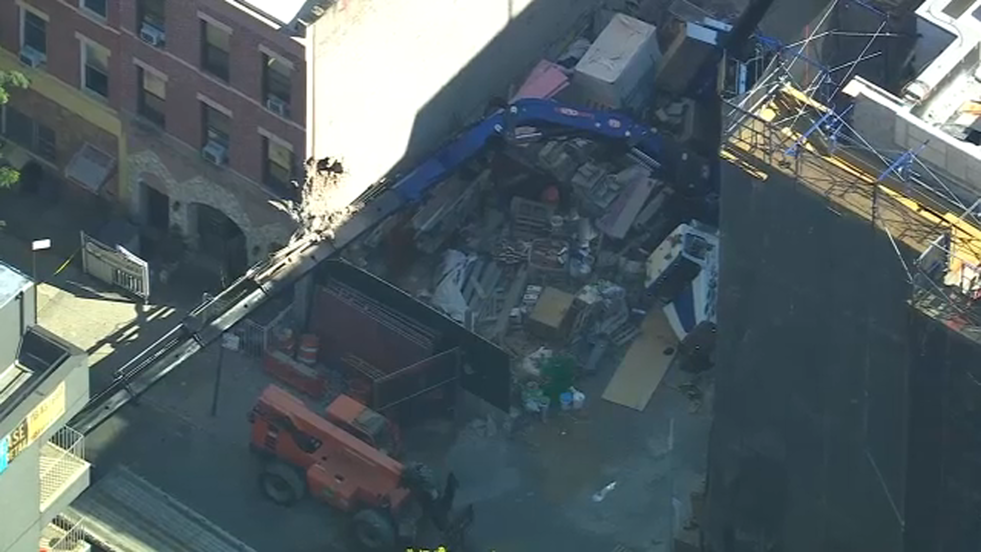 Collapse at site in Brooklyn causes boom truck to overturn