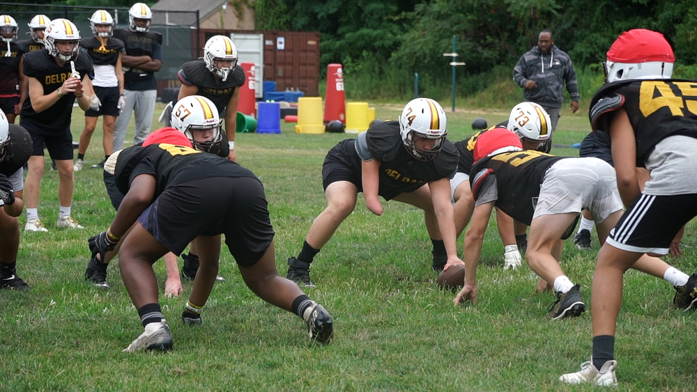 High school football player excels on field despite limb difference