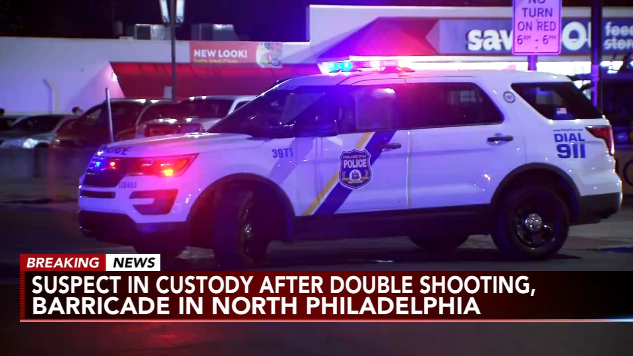 Police said a man wanted in a double shooting barricaded himself inside a North Philadelphia home o