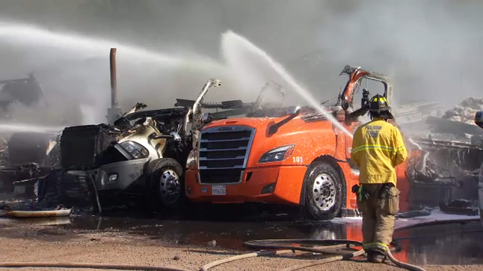 Fresno Fire crews battle flames in truck yard amid extreme heat