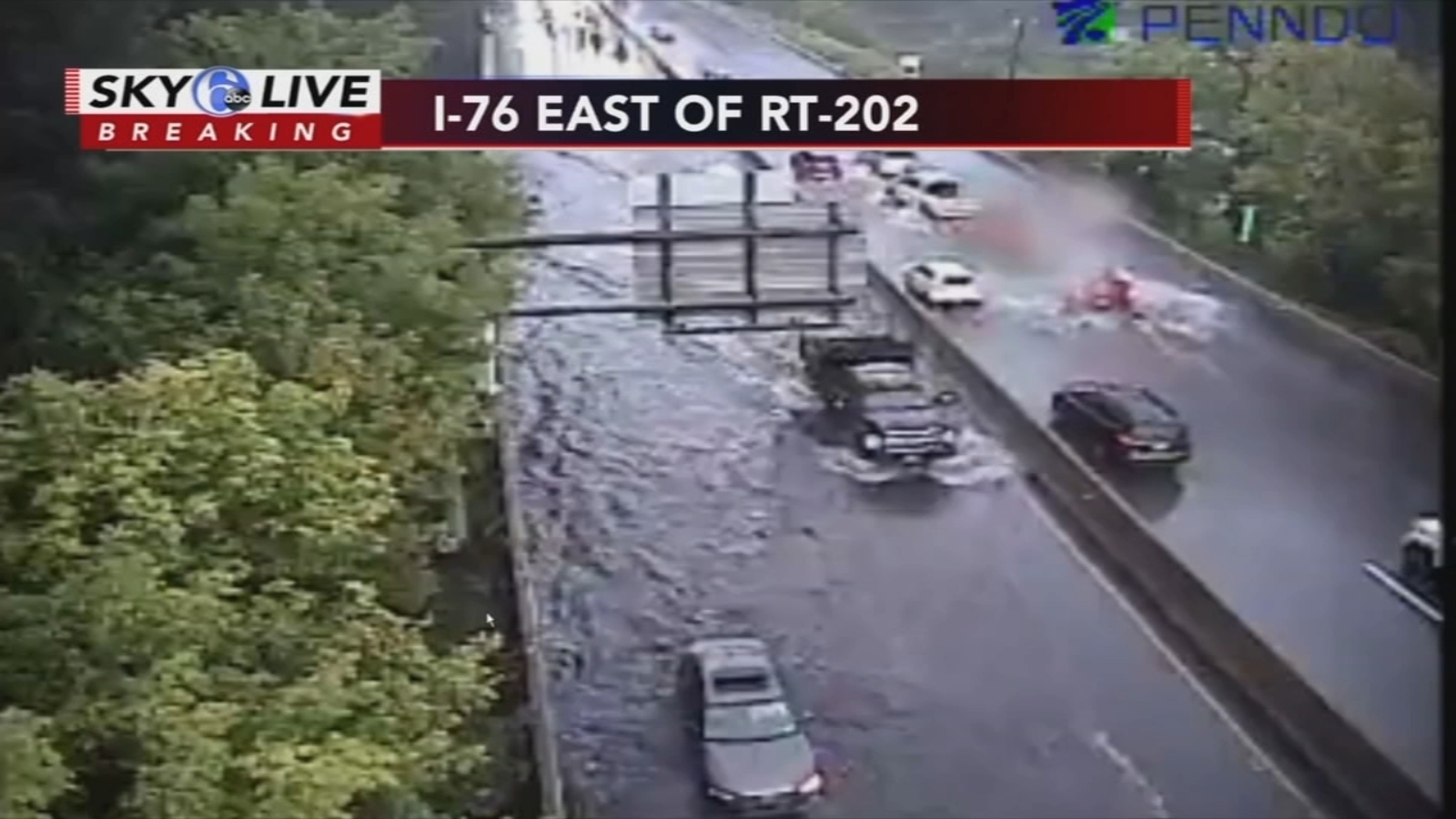 I76 Flooding Drivers try to make their way through flooded Schuylkill